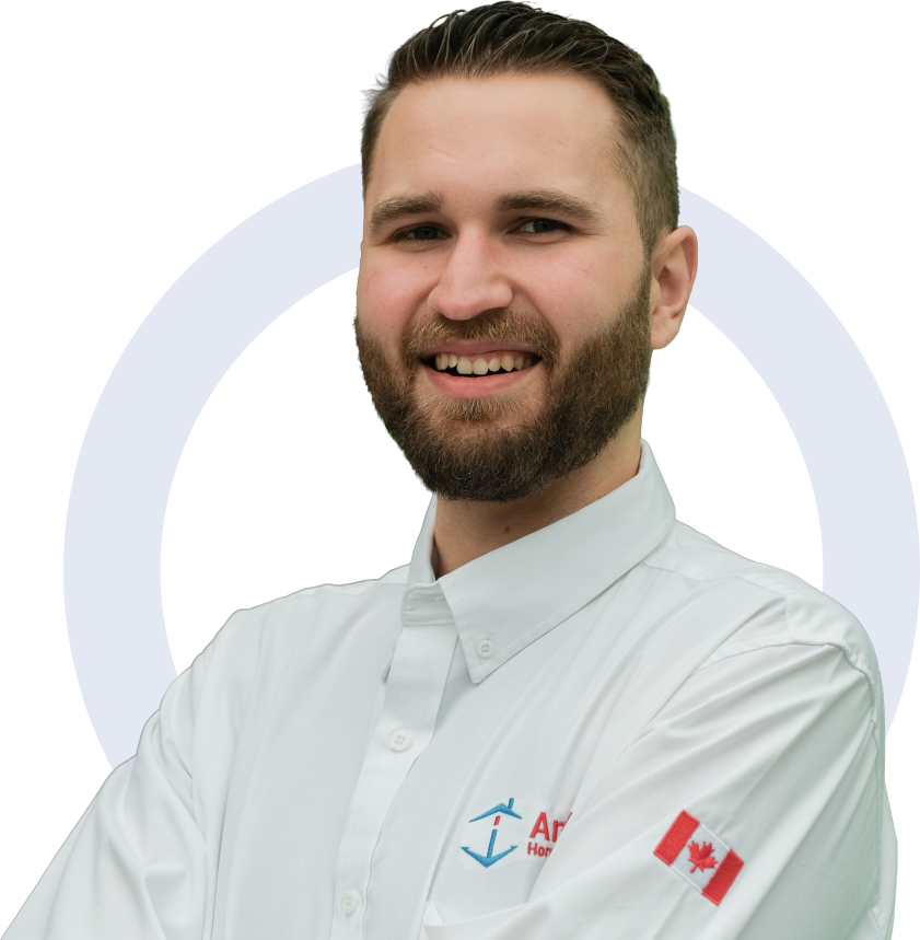 Anchor Home Comfort Plumbing team member in his white uniform, smiling broadly with teeth visible. Anchor Home Comfort Plumbing team member in his white uniform, smiling broadly with teeth visible.